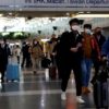 China ends Covid quarantine for travellers in January
