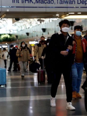 China ends Covid quarantine for travellers in January